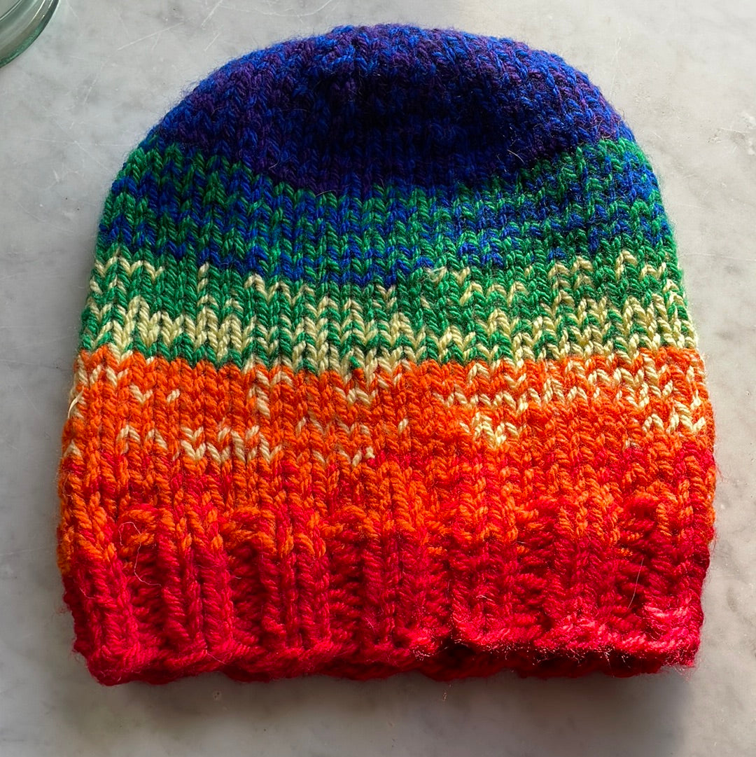 Hand knitted ombré rainbow beanie hat