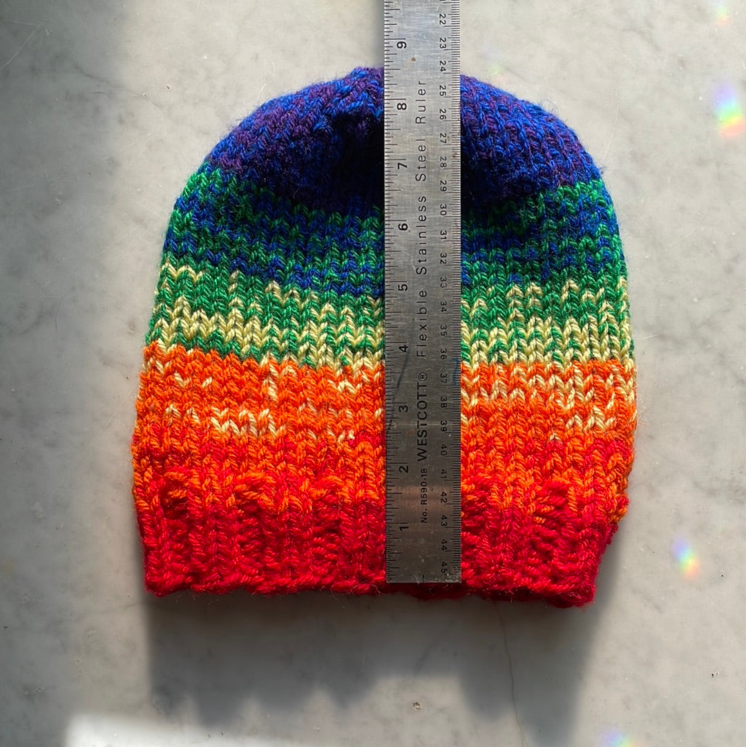Hand knitted ombré rainbow beanie hat