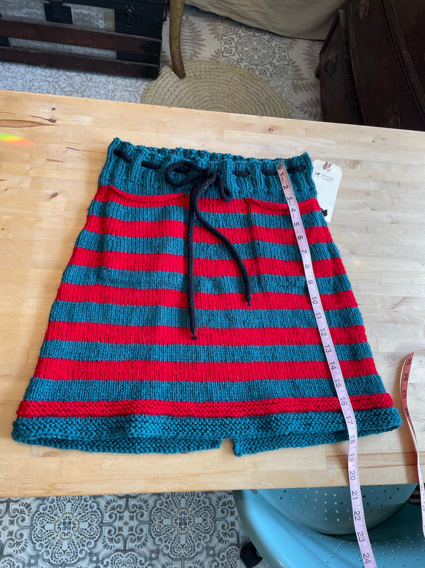 Hand Knitted Teal and Poppy Striped Skirt with Black Knitted Drawstring .