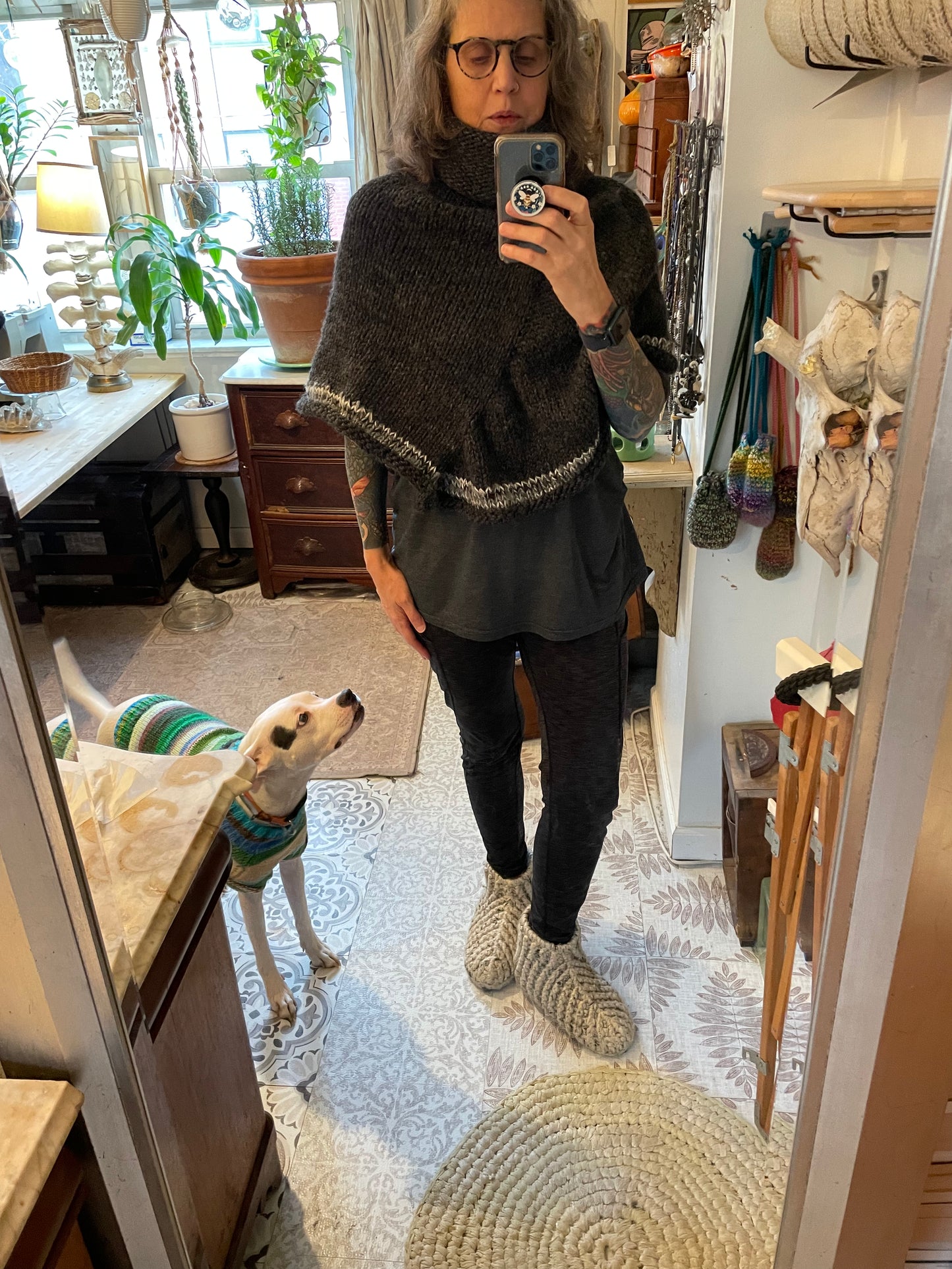 Hand knitted rolled turtleneck poncho charcoal grey with striped edging