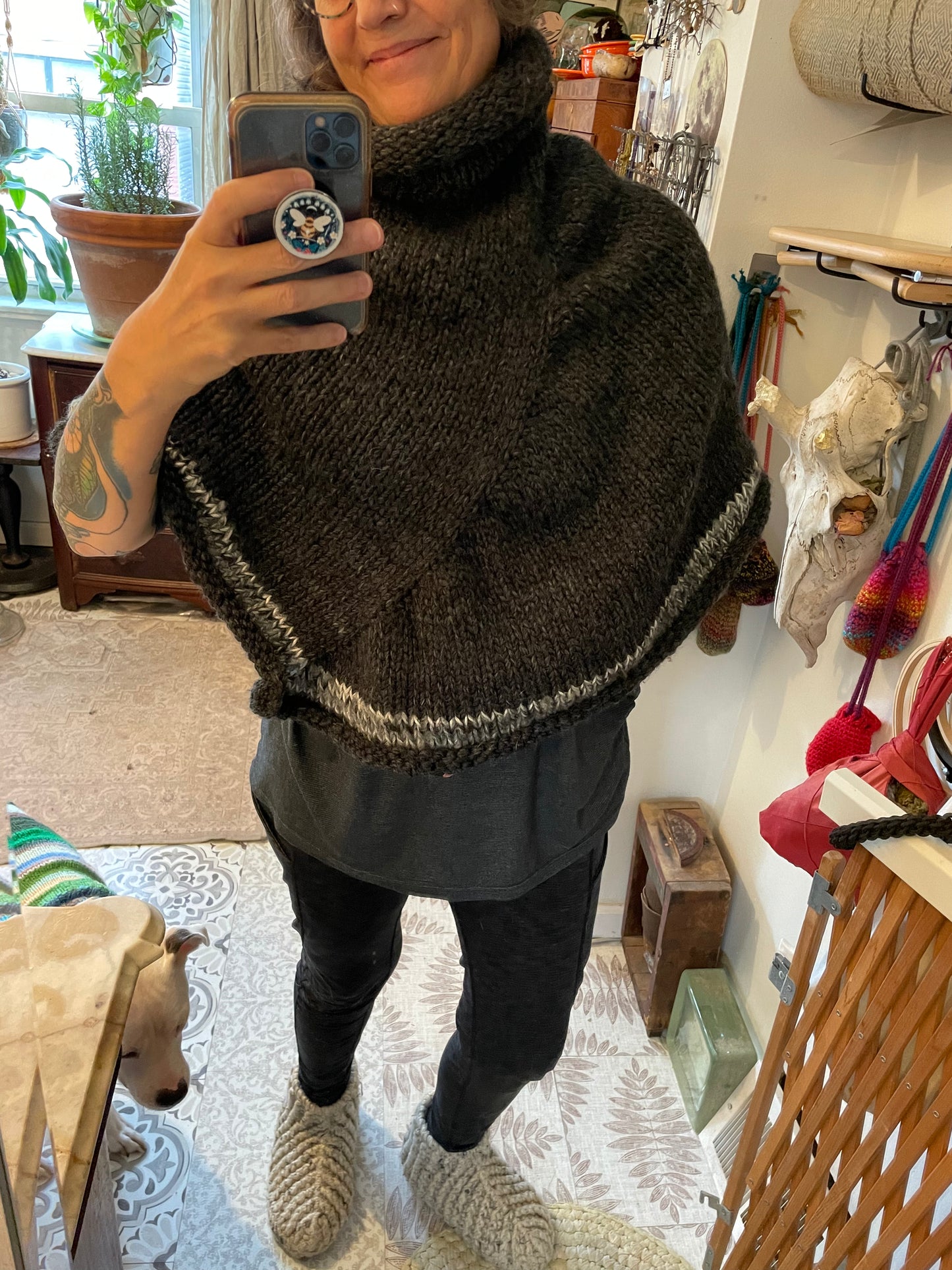 Hand knitted rolled turtleneck poncho charcoal grey with striped edging