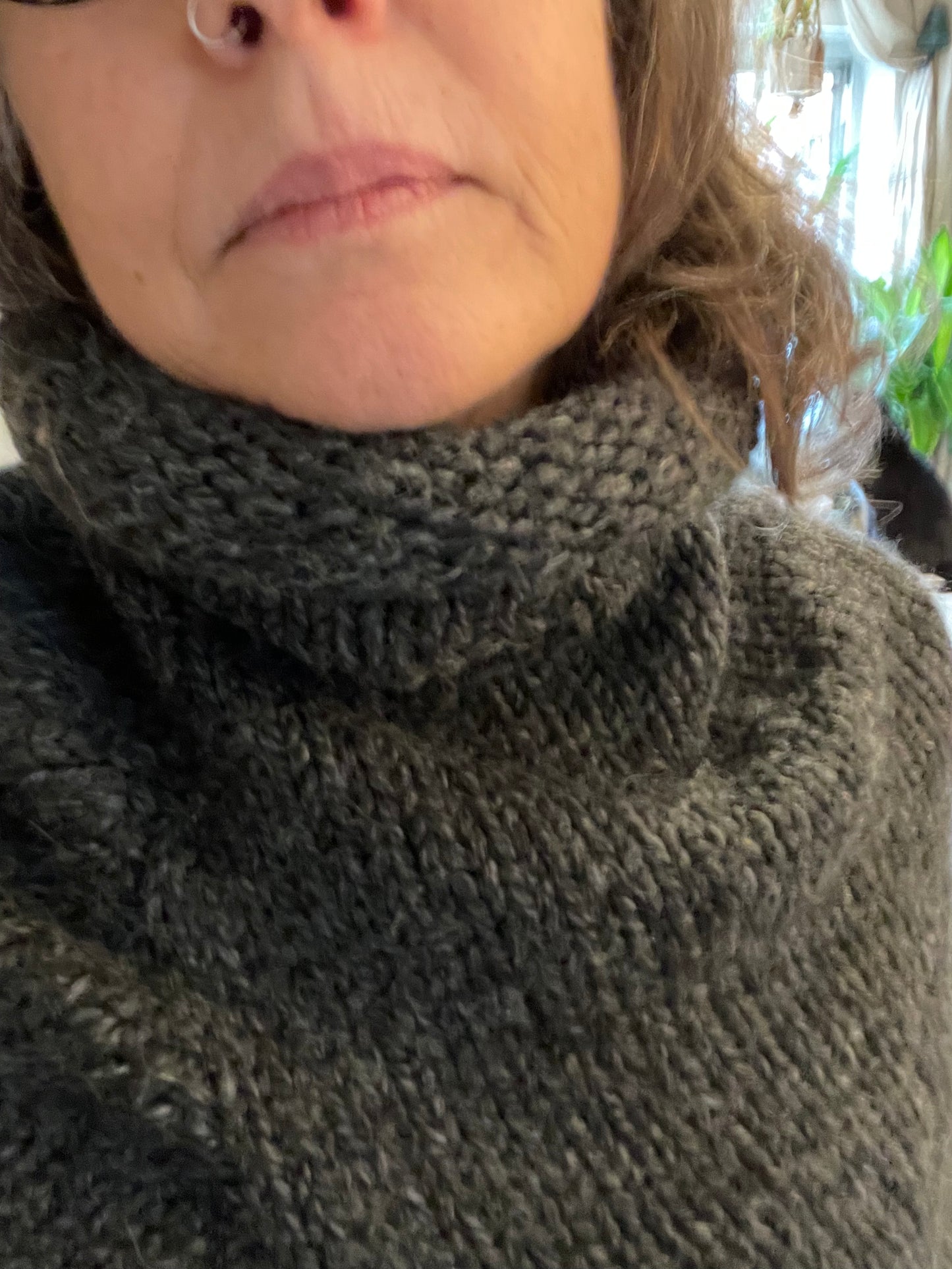 Hand knitted rolled turtleneck poncho charcoal grey with striped edging