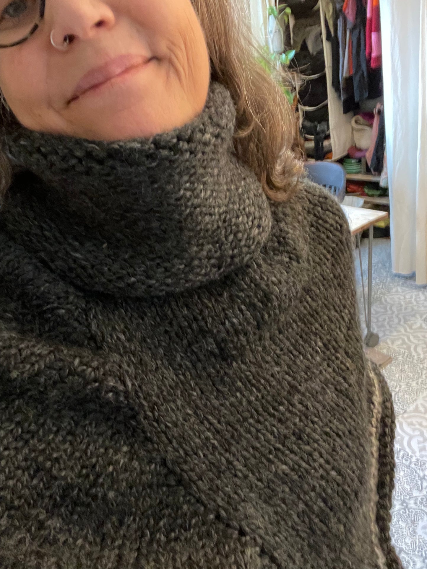 Hand knitted rolled turtleneck poncho charcoal grey with striped edging