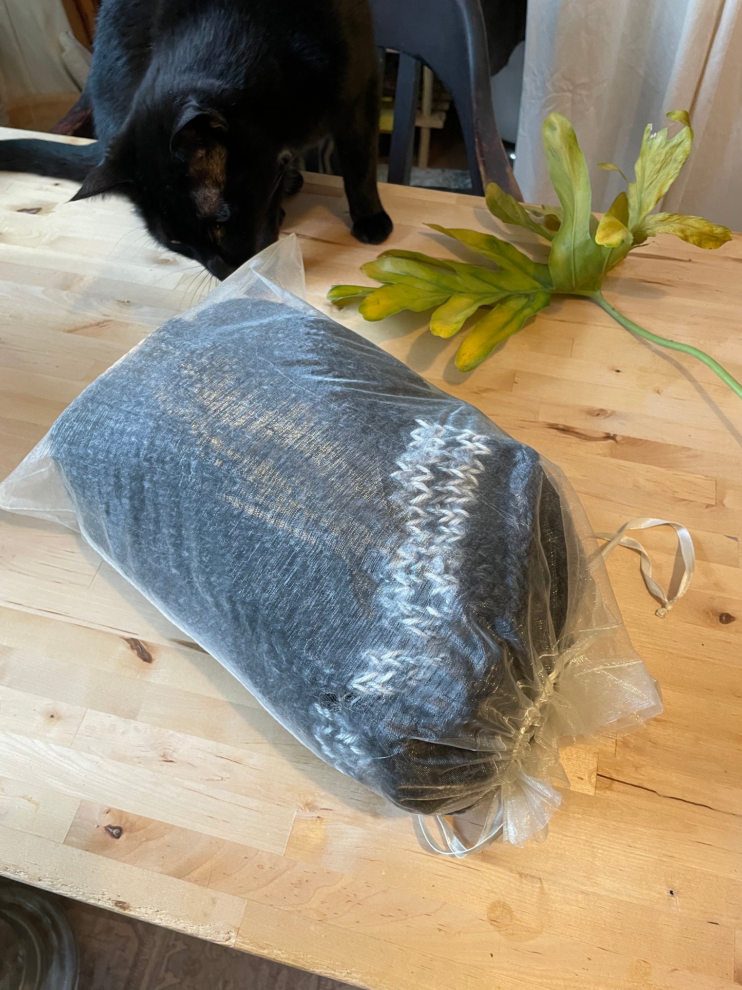 Hand knitted rolled turtleneck poncho charcoal grey with striped edging