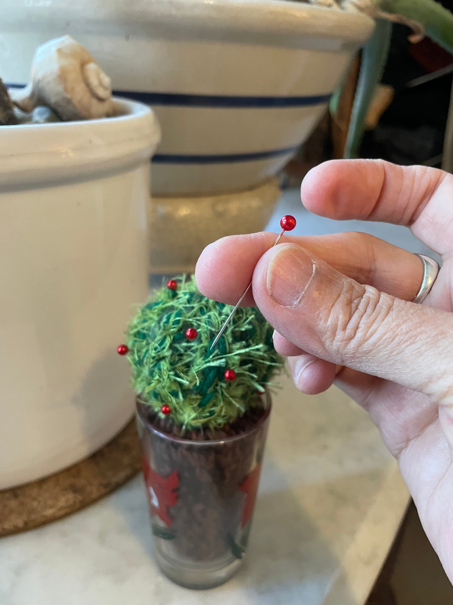 Cute little cactus pincushions in vintage jelly jar