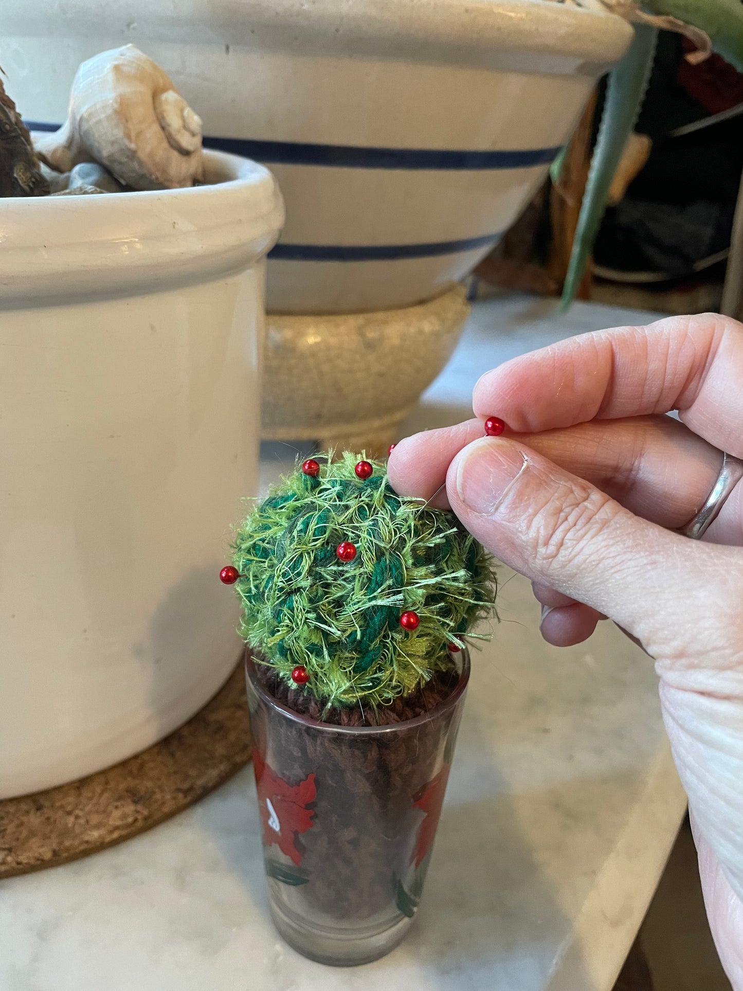 Cute little cactus pincushions in vintage jelly jar