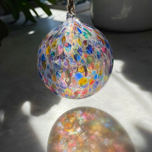 Translucent speckled Handblown glass ball ornament